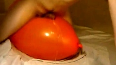 Twink Humping and Cumming on an Inflatable Orange Balloon