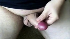 Pulling back the foreskin of my uncut cock