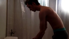 Twink takes shower while being recorded
